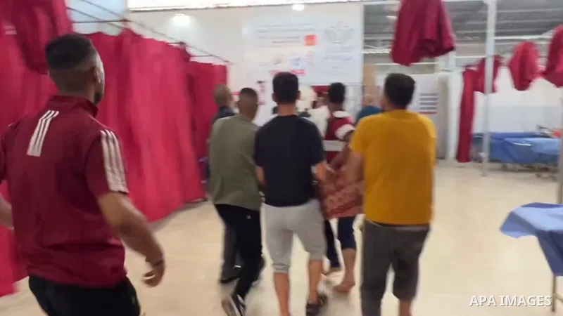 Restrictions Summary: APA wire clients only Shortlist: APAwire - APA wire clients only, Nuseirat- July 5, 2025. Plestinians transport the wounded and those who lost their lives incloud childern to Al-Awda Hospital in Nus...