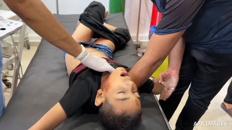 Restrictions Summary: APA wire clients only Shortlist: APAwire - APA wire clients only, Nuseirat- July 3, 2025. Relatives of 11-year-old martyr Hamza Siyam recount his final moments and the details of his death, after Is...