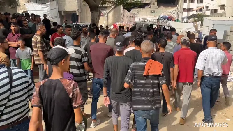 Restrictions Summary: APA wire clients only Shortlist: APAwire - APA wire clients only, Gaza City- July 1, 2025. Relatives of Palestinians who lost their lives include children mourn in Al-Shifa Hospital after an Israeli...