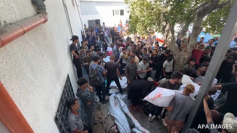 Restrictions Summary: APA wire clients only Shortlist: APAwire - APA wire clients only, Gaza city- June 30, 2025. Relatives of Palestinians who lost their lives mourn in Al-Shifa Hospital after an Israeli bombing of a ca...