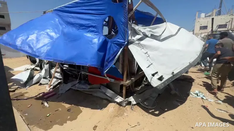 Restrictions Summary: APA wire clients only Shortlist: APAwire - APA wire clients only, Deir al-Balah- June 30, 2025. Palestinians check a tent that was damaged after an Israeli strike in the backyard of the Al-Aqsa Hosp...