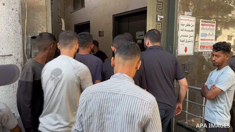 Restrictions Summary: APA wire clients only Shortlist: APAwire - APA wire clients only, Gaza city- June 30, 2025. Relatives of Palestinians who lost their lives incloud childern mourn in Al-Shifa Hospital after an Israel...