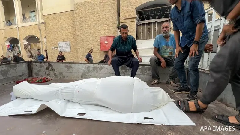 Restrictions Summary: APA wire clients only Shortlist: APAwire - APA wire clients only, Gaza city- June 30, 2025. Palestinians mourn who lost their lives in Al-Ahli Arab Hospital after an Israeli bombing at Al-Huria Scho...