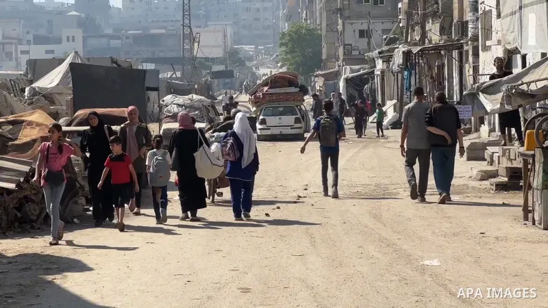 Restrictions Summary: APA wire clients only Shortlist: APAwire - APA wire clients only, Jabalia- June 29 June 2025. Palestinians, carrying their personal belongings, try to fled to safer areas to escape from Israeli atta...