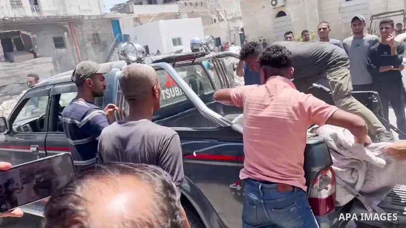 Restrictions Summary: APA wire clients only Shortlist: APAwire - APA wire clients only, Gaza city- June 29, 2025. Palestinians transport the wounded and who lost their lives to Al-Ahli Arab Hospital after an Israeli bomb...