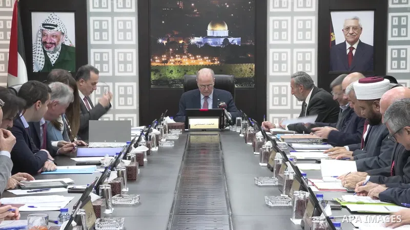 Palestinian Prime Minister Mohammad Mustafa chairs the weekly cabinet session in Ramallah, West Bank.