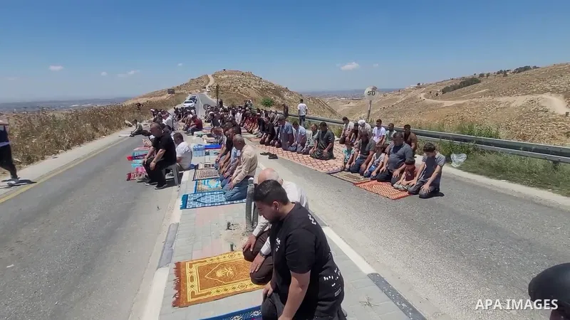 Restrictions Summary: APA wire clients only Shortlist: APAwire - APA wire clients only, Hebron - June 19, 2026. Palestinians gather during a protest against the confiscation of land for settlement expansion near Jabal Ta...