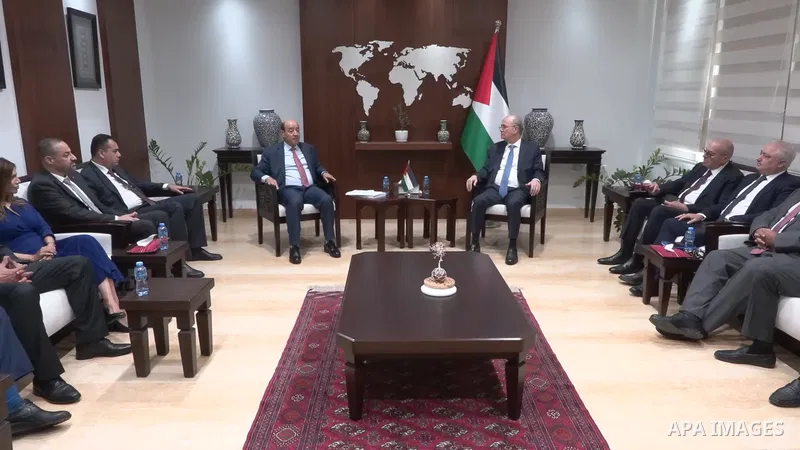 Restrictions Summary: APA wire clients only Shortlist: APAwire - APA wire clients only, Ramallah- West Bank- June 17, 2026. Palestinian Prime Minister Mohammad Mustafa receives the annual report of the Palestinian Nation...