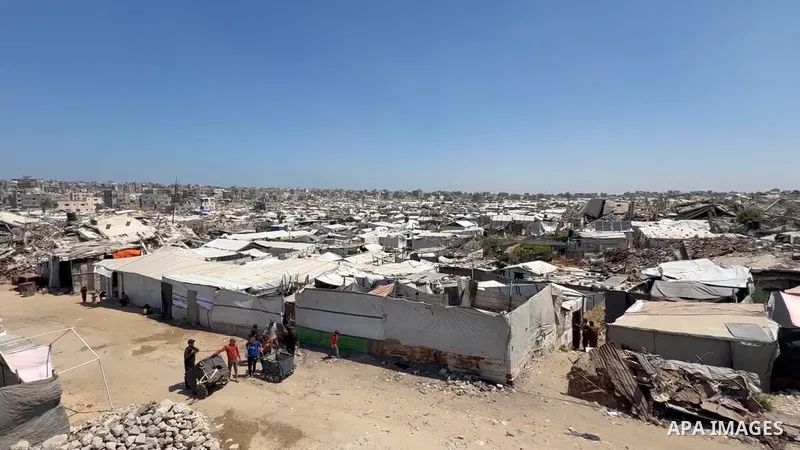 Restrictions Summary: APA wire clients only Shortlist: APAwire - APA wire clients only, Gaza City- June 17, 2026. Palestinian workers extract steel reinforcement bars from the concrete rubble of homes destroyed during th...