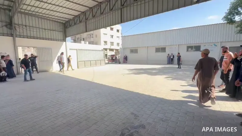 Restrictions Summary: APA wire clients only Shortlist: APAwire - APA wire clients only, Gaza- June 14, 2026. Palestinian medics transport bodies and wounded people to al-Shifa Hospital in Gaza City on June 14, 2026, foll...