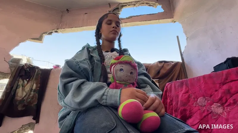 Restrictions Summary: APA wire clients only Shortlist: APAwire - APA wire clients only, Gaza- June 14, 2026. Twelve-year-old Palestinian girl Razan al-Hajj Ahmad, who lost her right eye after being injured in an Israeli...