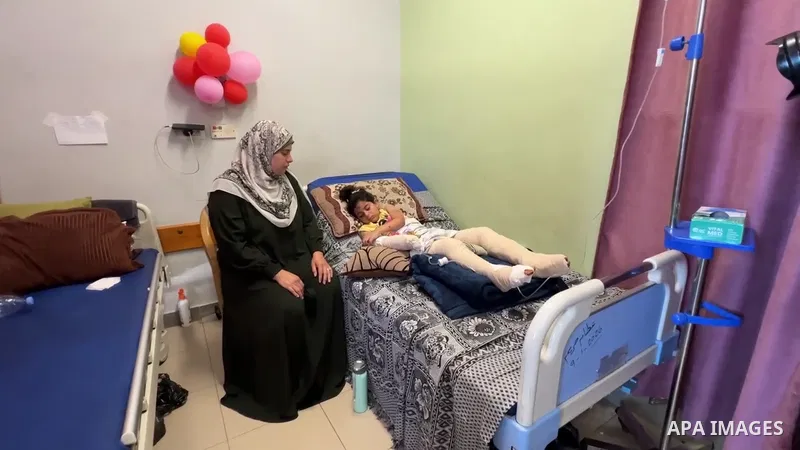 Restrictions Summary: APA wire clients only Shortlist: APAwire - APA wire clients only, Gaza- June 11, 2026.Seven-year-old Palestinian girl Hala Hassan Labbad lies on her bed in the burns unit at al-Shifa Hospital in Gaz...