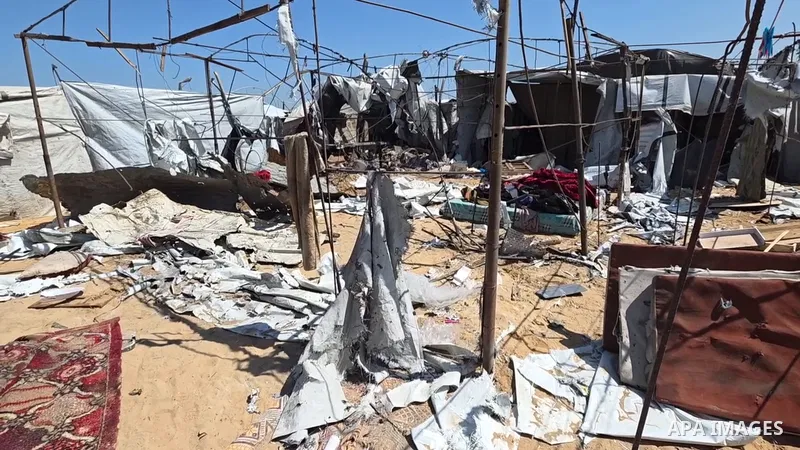 Restrictions Summary: APA wire clients only Shortlist: APAwire - APA wire clients only, Khan Younis- June 5, 2026. Displaced Palestinians inspect damage to their tents in the Mawasi area of Khan Younis, southern Gaza Str...