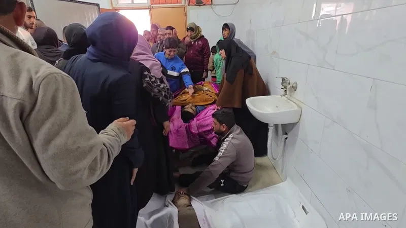 Restrictions Summary: APA wire clients only Shortlist: APAwire - APA wire clients only, Khan Yunis- January 31, 2026. Palestinians mourn death of their loved ones after Israeli forces targeted a tent sheltering displaced...